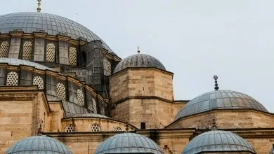 Detailed view of the cascading domes and stone walls of the Süleymaniye Mosque in Istanbul